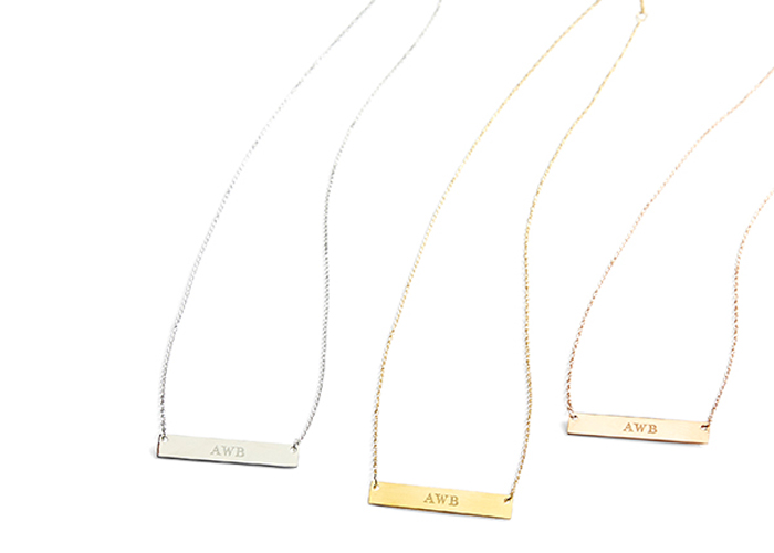 A set of cute engraved bar necklaces.