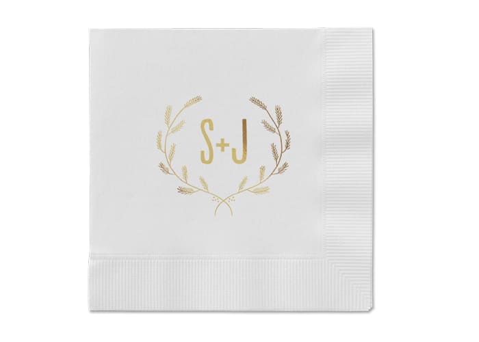 A set of personalized wedding napkins with initials.