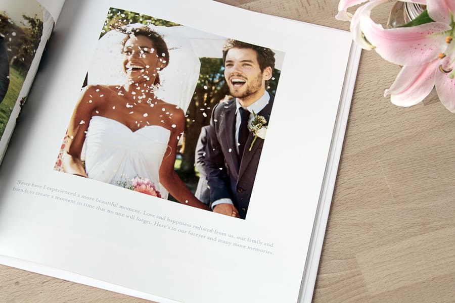 Bride and groom in photo book.